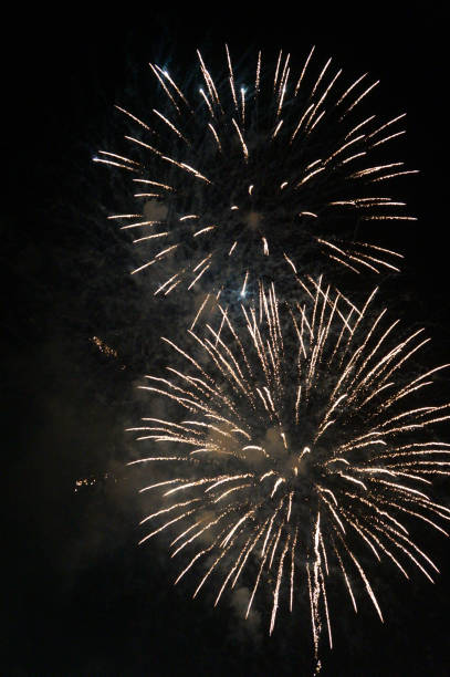istock golden fireworks in black background 1061322466
