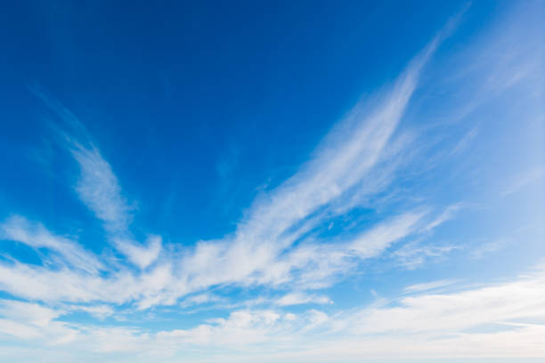 istock Bright sky blue background. Sky in daylight with beautiful white cloud. 1061323258