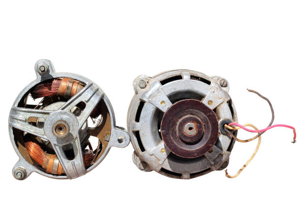 istock Two old electric motors isolated on white background 1061324034