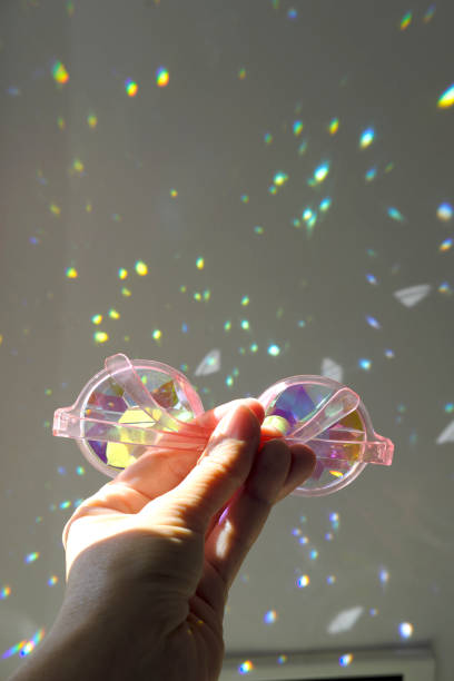 istock Crop Hand Holding Diamond Stylish Glasses 1061325598
