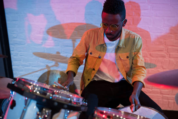 istock African-American Man Playing Drums 1061325834