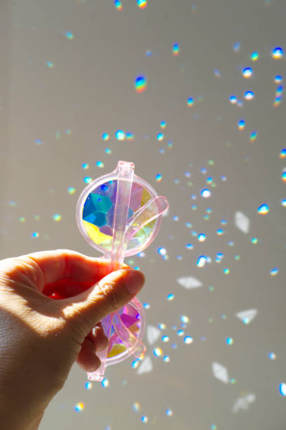 istock Crop Hand Holding Diamond Stylish Glasses 1061326358