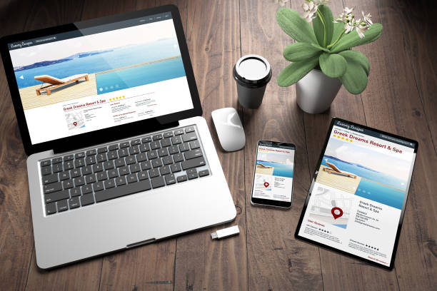 istock three devices on wooden desk top view directory resort 1061328666