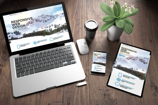 istock three devices on wooden desk top view mountain 1061328688