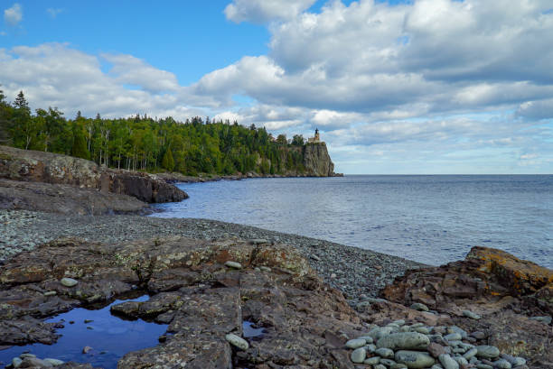 istock Panoramic view of the Split Rock Lighthouse from a nearby rocky beach 1061329214