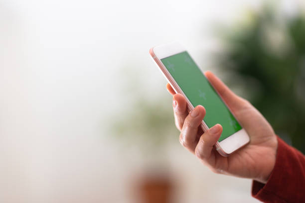 istock Hand of woman holding technology 1061331562