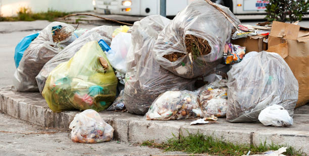 istock Waste bags in the street on the sidewalks 1061332220