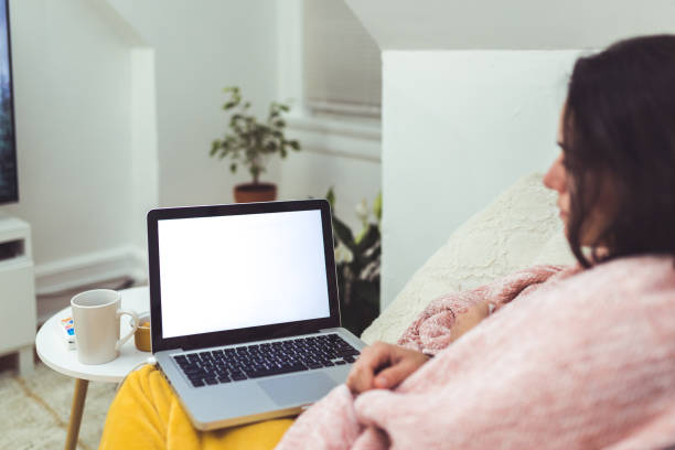 istock Sick woman in front of computer 1061340736