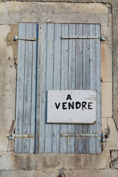 istock French House for sale with A vendre (for sale) on the shutter 1061341364