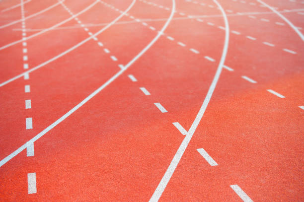 istock Track and Field with number start running race 1061343158