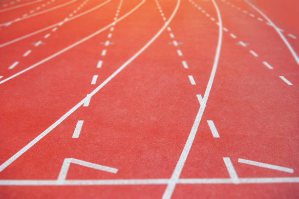 istock Track and Field with number start running race 1061343278