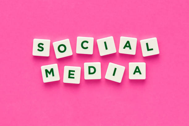 istock Social media written with letters on pink background 1061343330