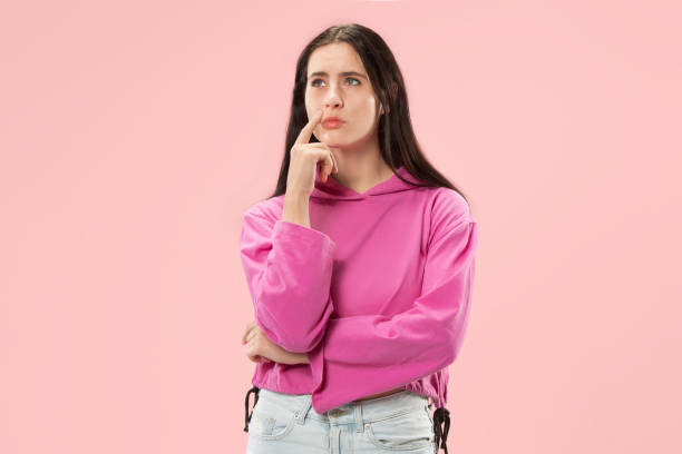 istock Young serious thoughtful business woman. Doubt concept. 1061346172