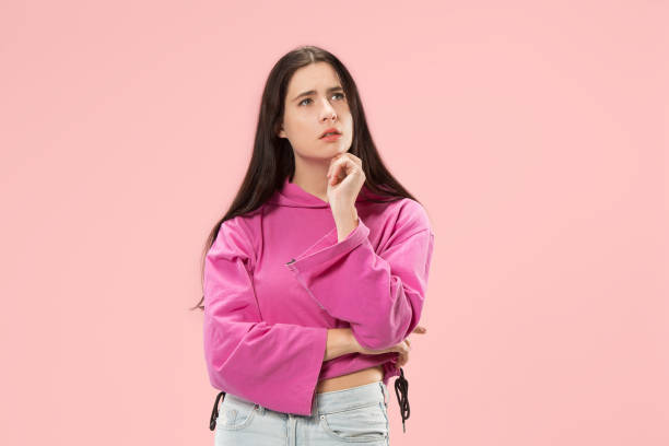istock Young serious thoughtful business woman. Doubt concept. 1061346206