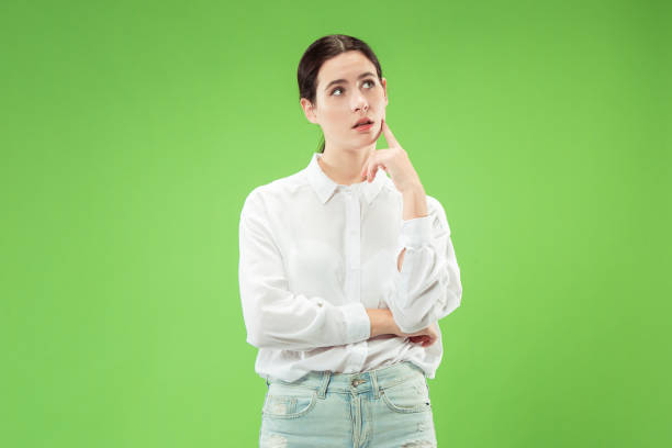 istock Young serious thoughtful business woman. Doubt concept. 1061354614