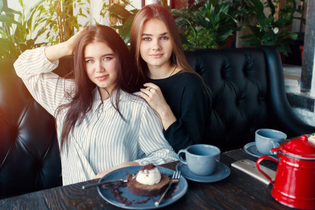 istock Two young women taking selfie with smart phone 1061357564