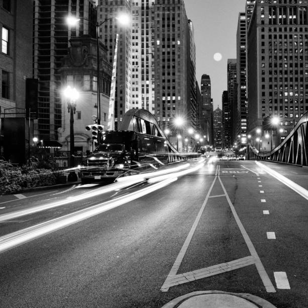 istock Traffic in the night, Downtown Chicago. Black And White. 1061357892