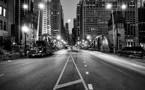 istock Traffic in the night, Downtown Chicago. Black And White. 1061357896