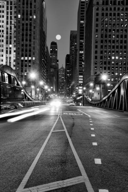 istock Traffic in the night, Downtown Chicago. Black And White. 1061358020