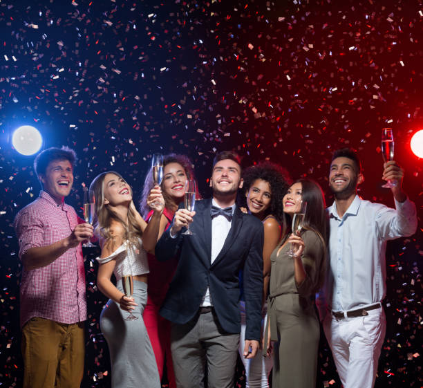 istock Happy diverse friends celebrating New Year together 1061358048