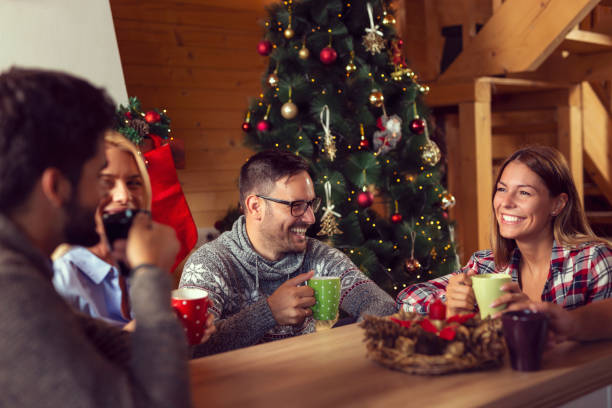 istock Friends drinking coffee on Christmas morning 1061358348
