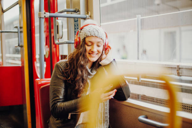 istock Young woman in public transport 1061370668