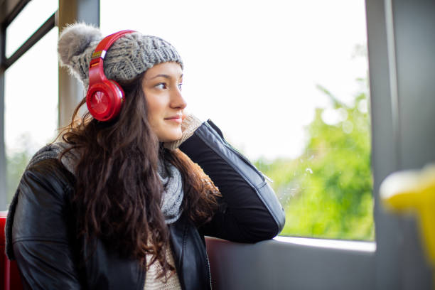 istock Young woman in public transport 1061371454