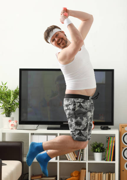 istock young caucasian brunette man jump 1061372308