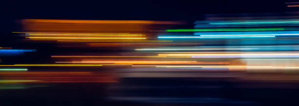 multicolor light trails - lighting equipment night traffic highway imagens e fotografias de stock