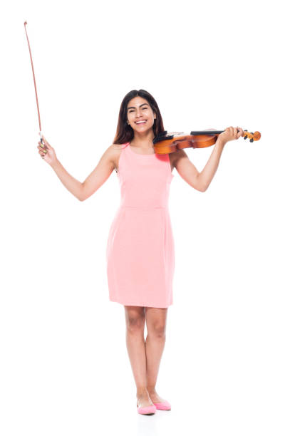 istock Beautiful young latina playing the violin 1061377596