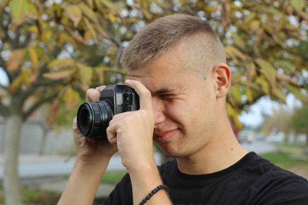 istock Young photographer take photos 1061380278