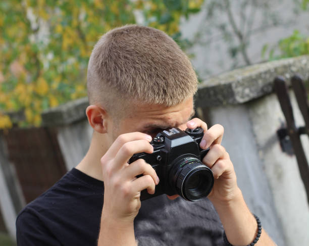 istock Young photographer take photos 1061380342