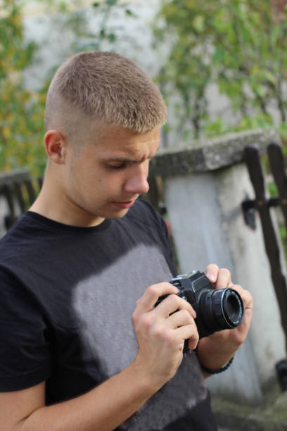 istock Young photographer take photos 1061380626