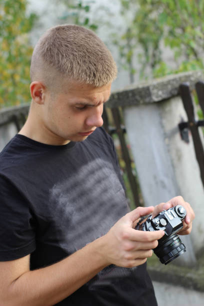 istock Young photographer take photos 1061380638