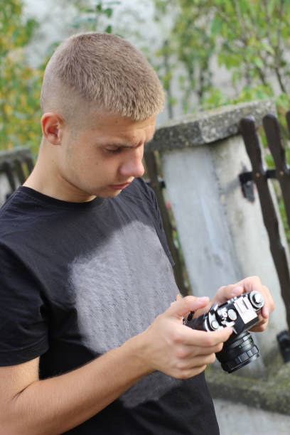 istock Young photographer take photos 1061380682