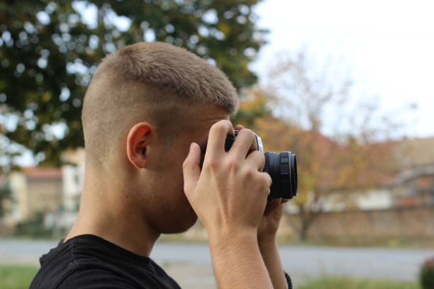 istock Young photographer take photos 1061380726
