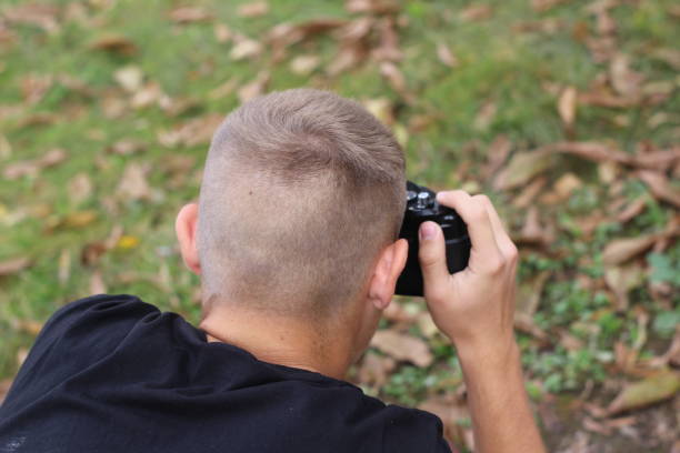 istock Young photographer take photos 1061380902