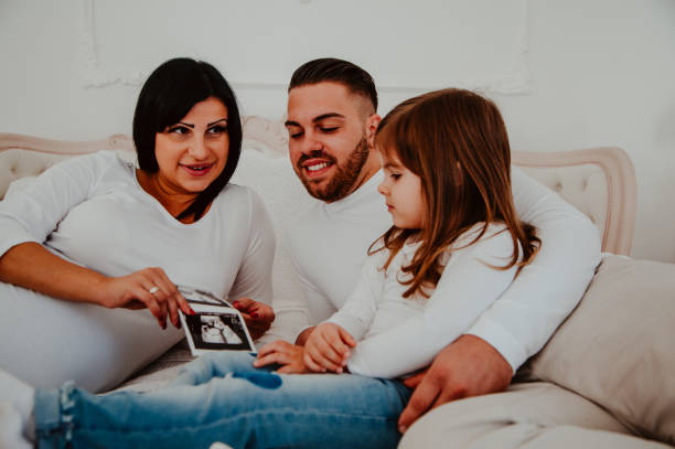 istock Young parents with child 1061386106