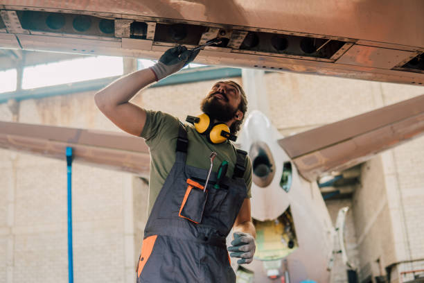 istock Young mechanic repairing airplane 1061386204