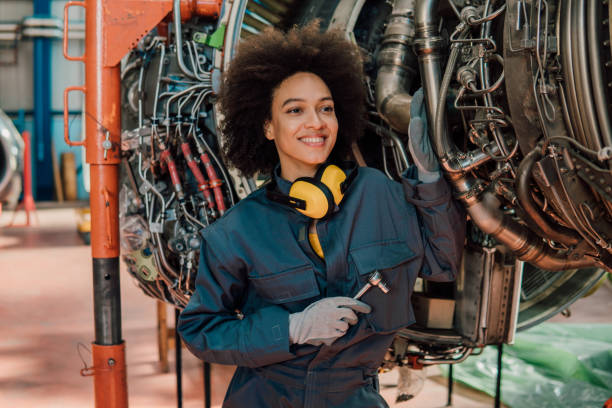 istock Female mechanic holding a wrench 1061386658