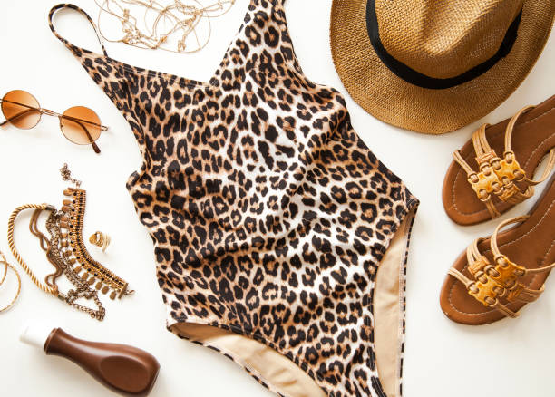 istock Female summer bikini swimsuit accessories on white background 1061401052