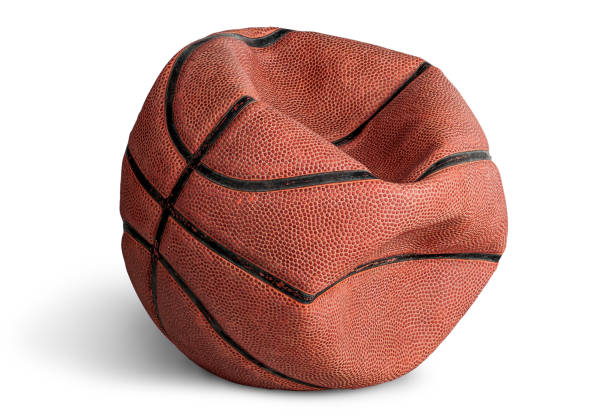 Old deflated basketball Old deflated basketball isolated on white background deflated stock pictures, royalty-free photos & images