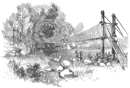 Suspension bridge across the Reventazón River at Orosí in Cartago Province, Costa Rica (circa mid 19th century). Vintage etching circa mid 19th century.