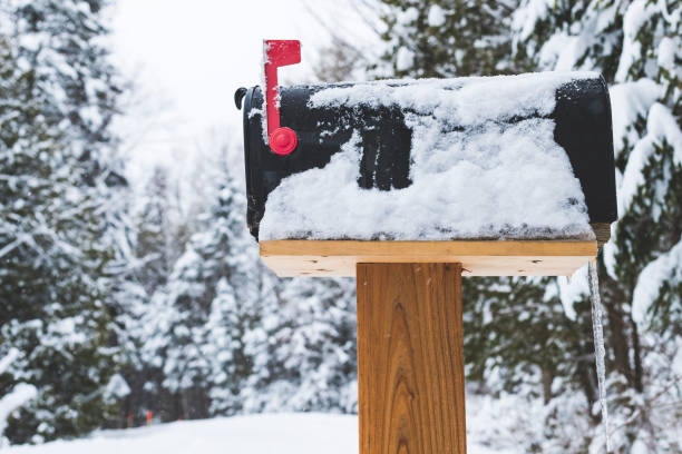 istock Post Box with Red Flag during Winter Frosty Month 1061405672