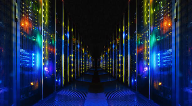 Shot of Corridor in Large Working Data Center Full of Rack Servers and Supercomputers. fantastic view of mainframe in the data center row byte photos stock pictures, royalty-free photos & images