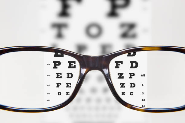 Eyeglasses during optometric examination stock photo