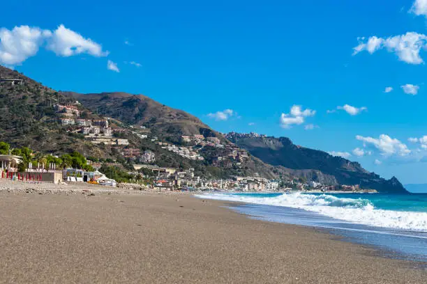 Photo of Letojanni. Nestled to the north of Taormina, Letojanni is a popular coastal resort. Sicily, Italy.