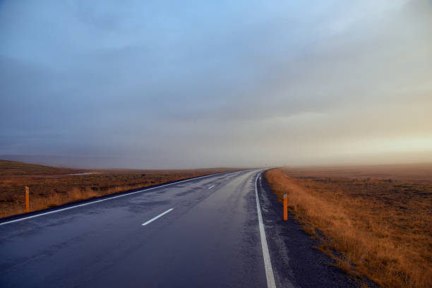 istock Foggy road in Iceland 1061425994
