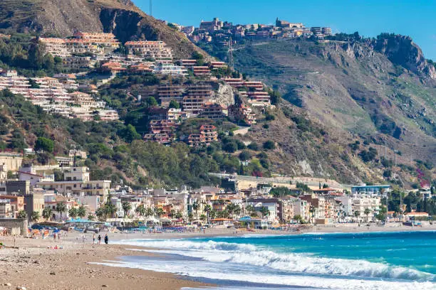 Photo of Letojanni. Nestled to the north of Taormina, Letojanni is a popular coastal resort. Sicily, Italy.