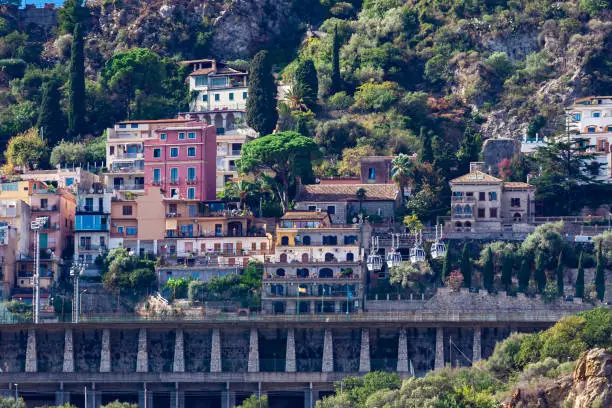 Photo of View from Letojanni to Taormina. Letojanni nestled to the north of Taormina, Letojanni is a popular coastal resort. Sicily, Italy.